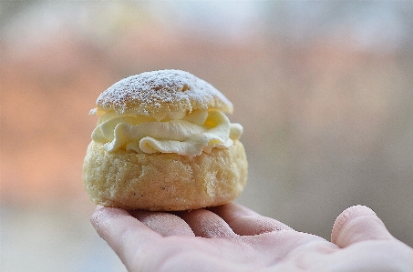 Hand white sweet dish Photo