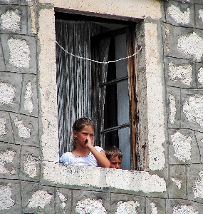 Girl house window boy Photo