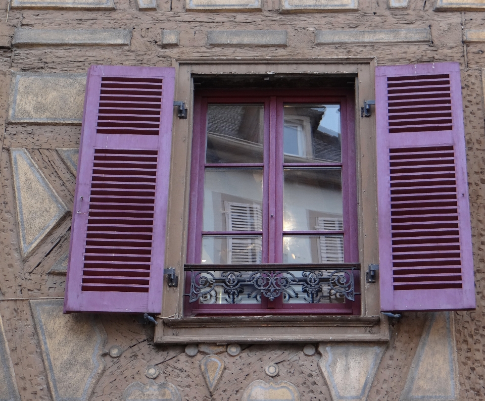 Wood house purple window