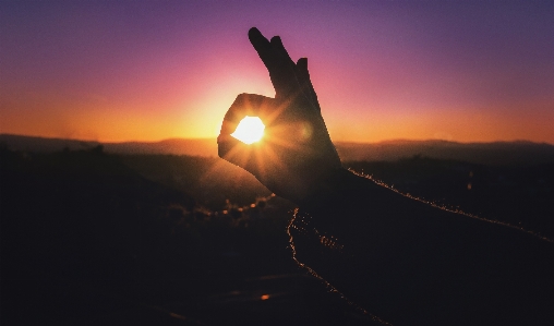 Hand horizon silhouette mountain Photo