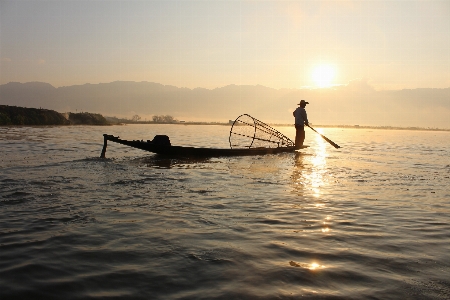 Man sea water sun Photo