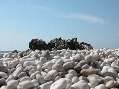 Sea coast sand rock Photo