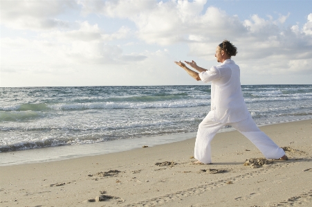 Man beach sea water Photo