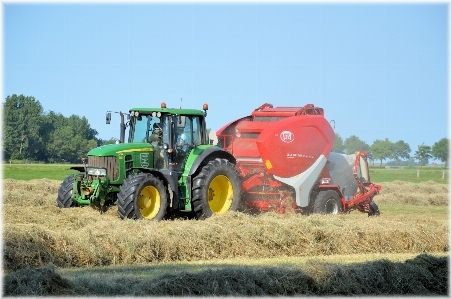 Work tractor bale field Photo