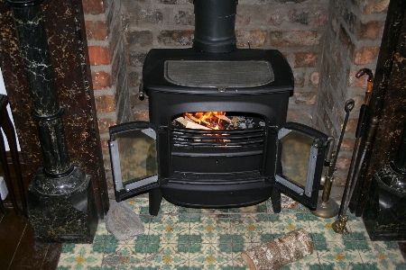 Glowing red chimney flame Photo