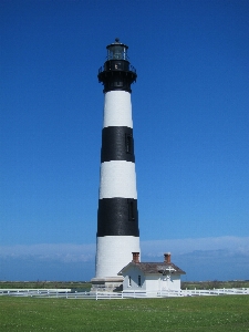 Coast light lighthouse pier Photo