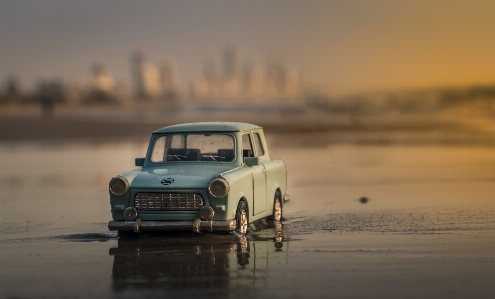 Beach water sand sunset Photo