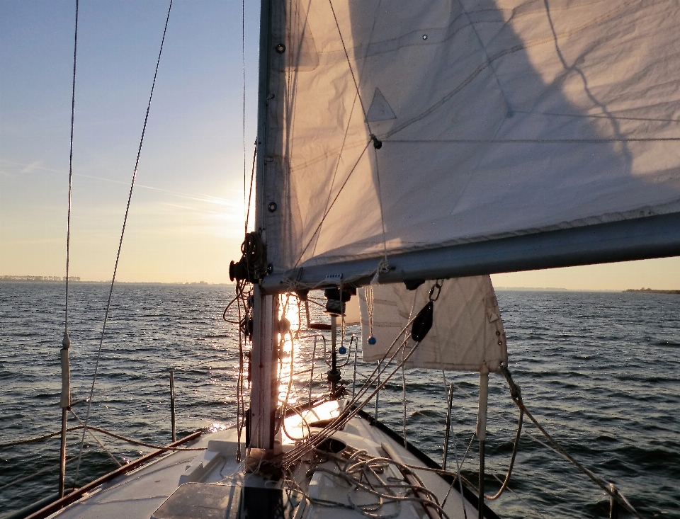 海 日落 船 风