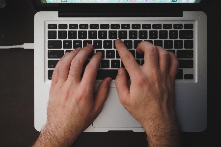 Laptop writing hand typing Photo