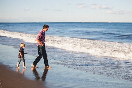 Man beach sea coast Photo