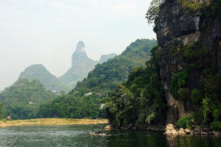 Landscape mountain mist boat Photo