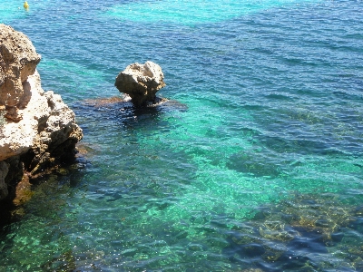 Foto Laut pesisir rock matahari