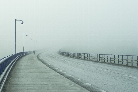 Silhouette person snow fog Photo