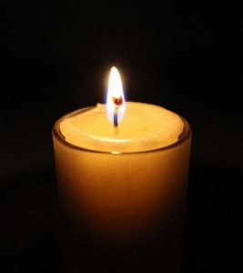 Glowing night flame candle Photo