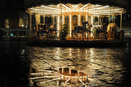 Night evening reflection amusement park Photo