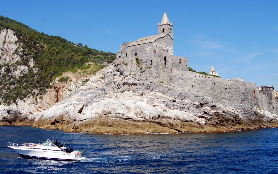 Sea coast rock boat