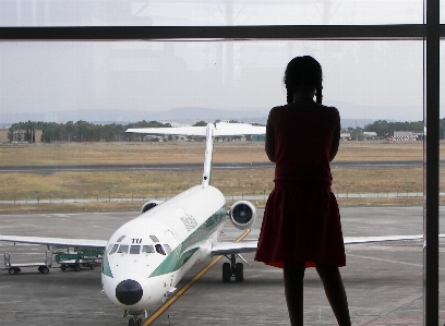 Girl airport airplane aircraft Photo