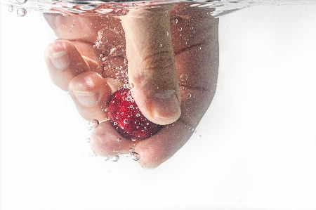 Hand water woman raspberry Photo