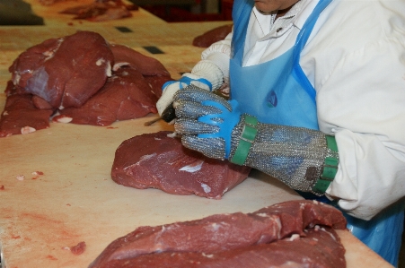 Foto Orang sarung tangan makanan daging