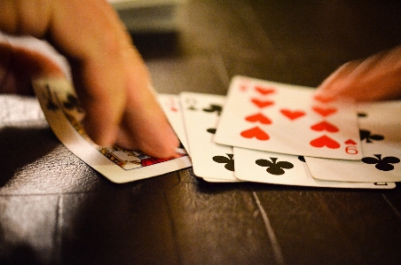 Hand table game play Photo