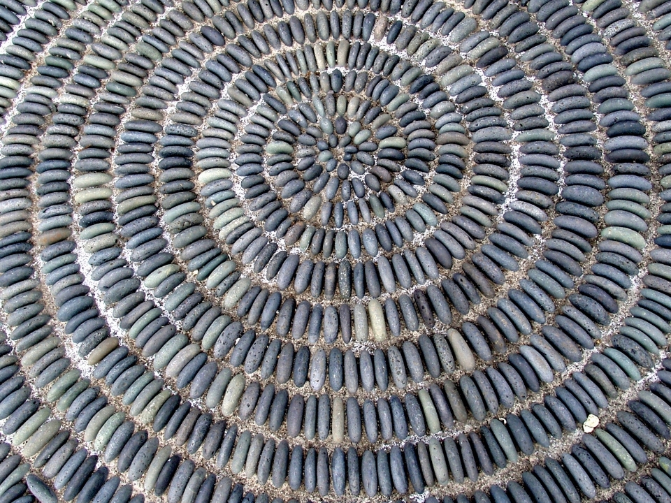 Structure ground spiral stone