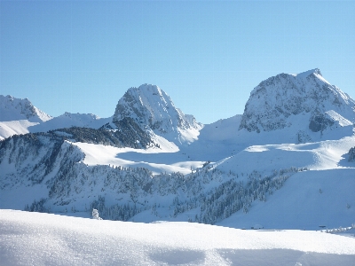 Mountain snow winter sky Photo