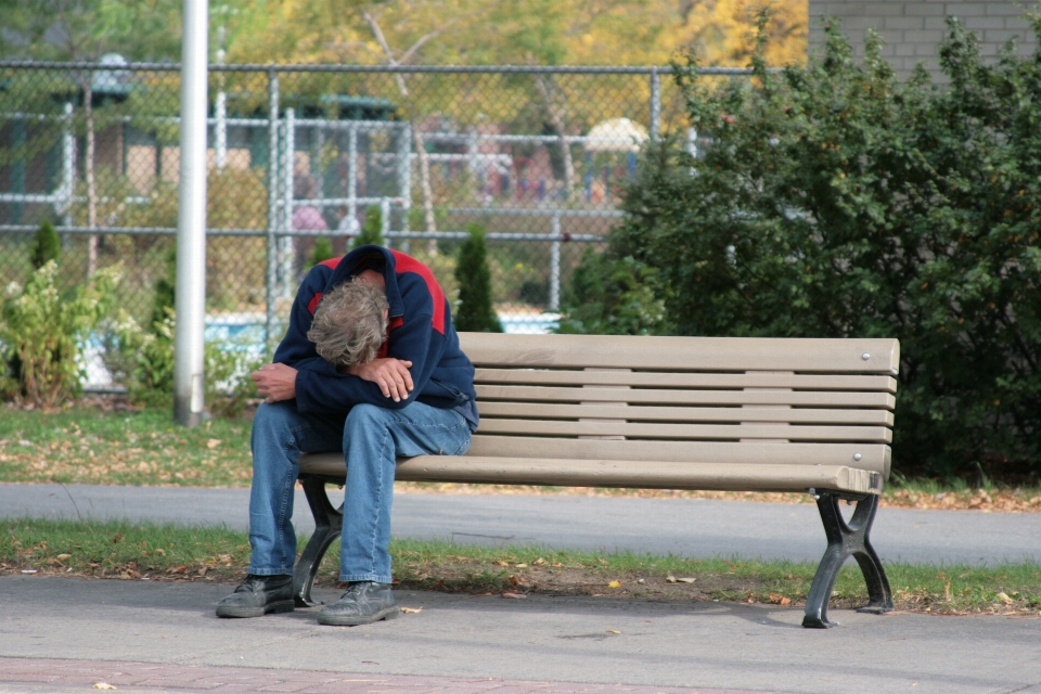 Man pedestrian park sad