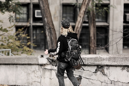 Man walking road street Photo