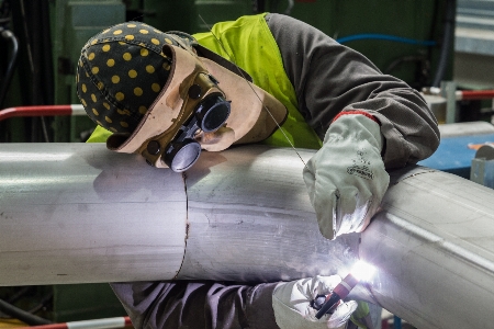 Vehicle factory pipes welder Photo