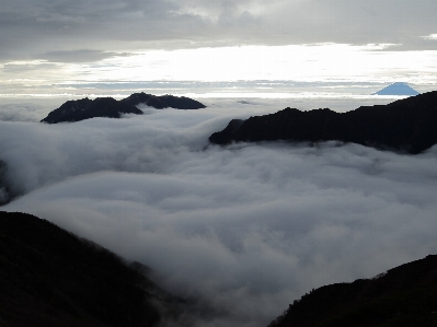 Sea coast ocean mountain Photo