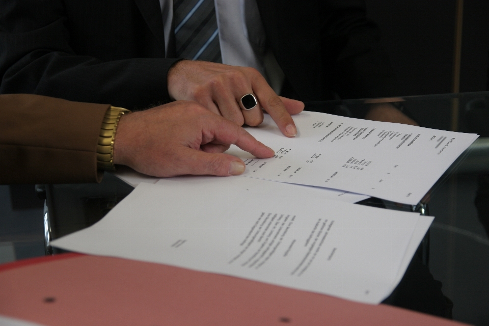 Desk writing hand meeting