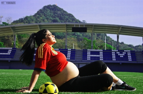 Foto Halaman rumput sepak bola stadion pemain