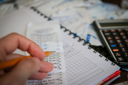 Writing hand money business Photo