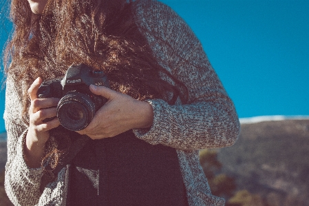 Hand girl woman camera Photo