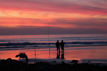 Man beach sea coast Photo