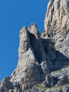 Rock walking mountain sky Photo