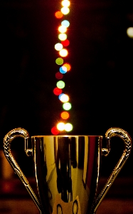 Light bokeh celebration cup Photo