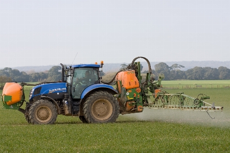 Tractor field farm asphalt Photo