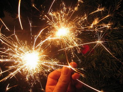 Hand light star sparkler Photo