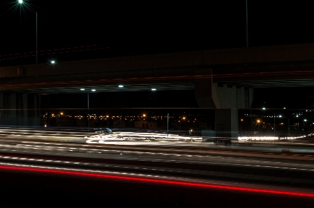 Light traffic night highway Photo