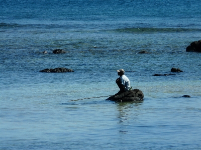 Foto Homem praia mar costa