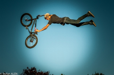 Man person bicycle jump Photo