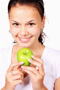 Hand apple girl woman Photo