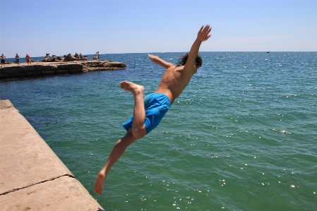 Man beach sea water Photo