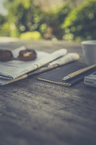 Notebook writing hand table Photo