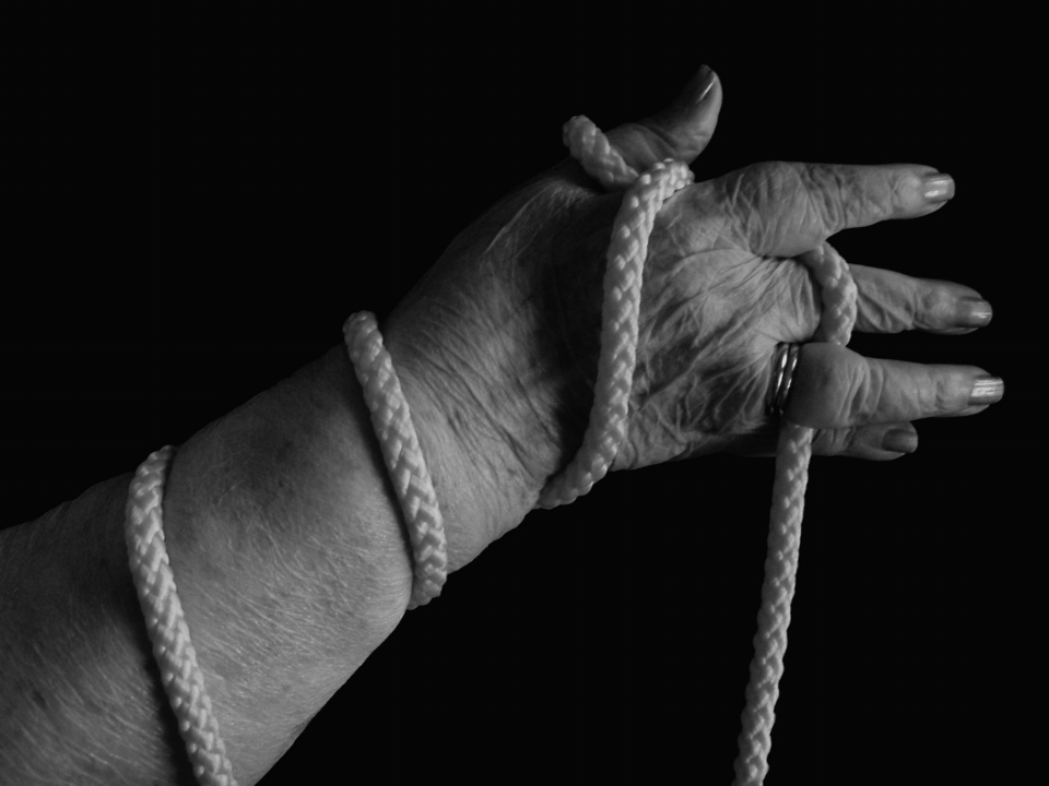 Hand rope black and white woman