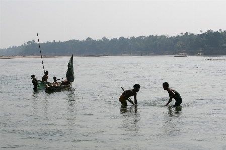 Man beach sea water Photo