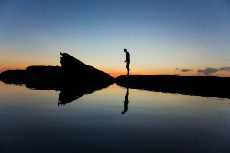 Man beach sea coast Photo