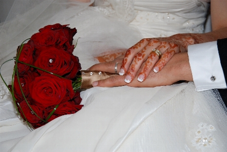 Hand woman white flower Photo