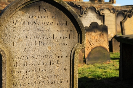 Old stone cemetery tombstone Photo